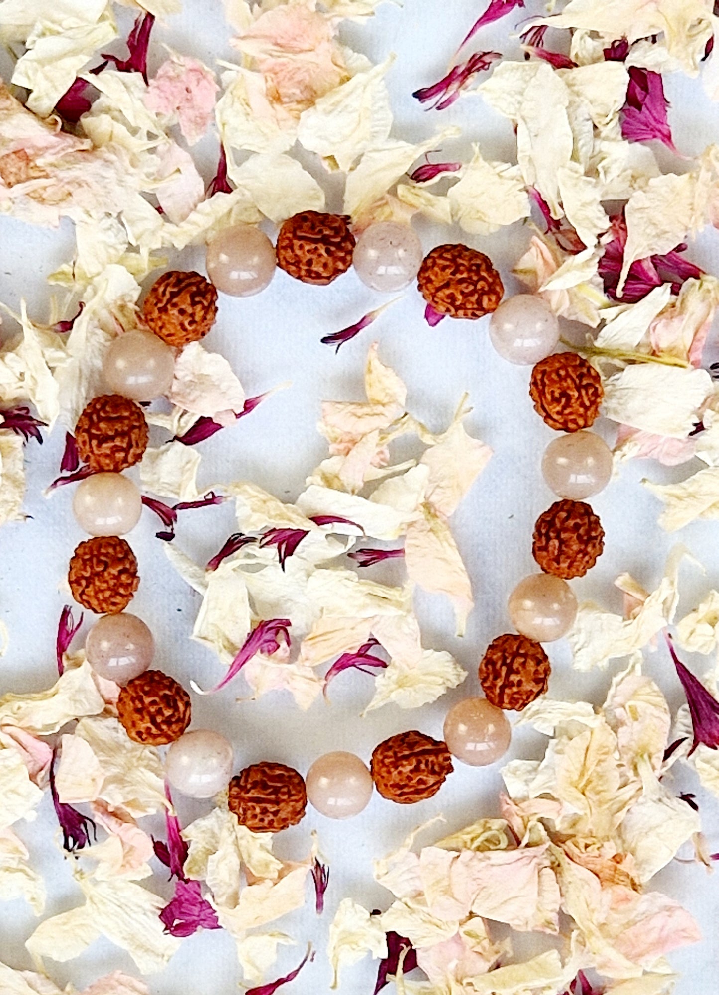 Armband rudraksha / perzikmaansteen